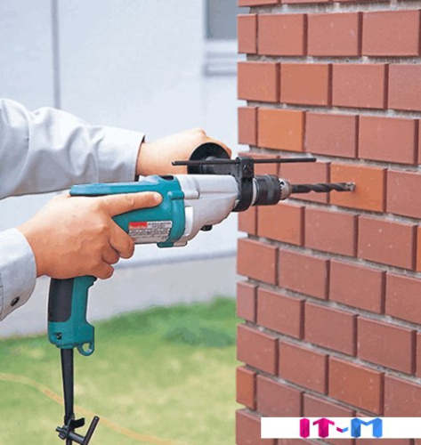 Ударная дрель Makita HP2051F фото 2